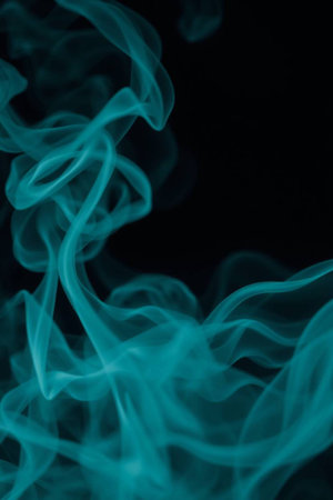 blue smoke on black background. Abstract background. Texture. Design element.の写真素材