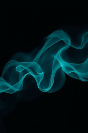 Blue smoke on black background. Abstract background. Texture fog. Design element.