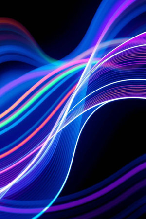 abstract colorful wavy lines on black background with copyspace