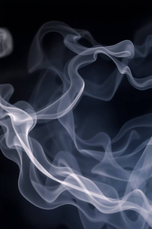 Abstract smoke on black background, close-up, studio shot.