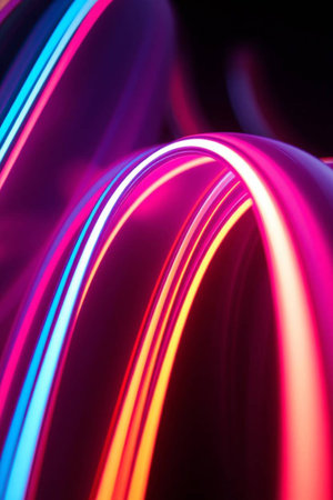 abstract color background with motion blurred magic neon light curved lines.の写真素材