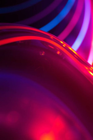 abstract background with circles and lines in red, blue and purpleの写真素材