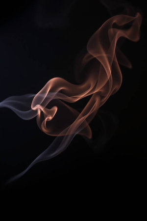 Smoke isolated on black background. Abstract colored smoke on black background.の写真素材