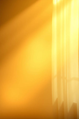 abstract yellow background with some smooth lines in it and some light effectsの写真素材