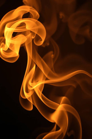 yellow smoke on black background close-up, abstract background for design