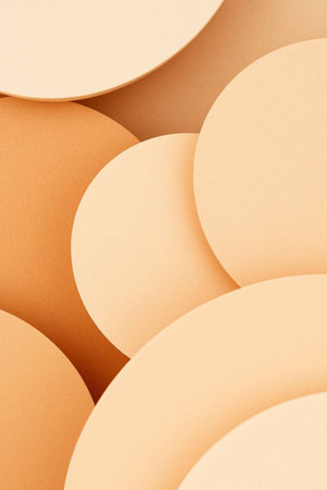 abstract background with paper circles in beige and beige colorsの写真素材