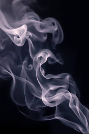 Smoke on a black background. Shallow depth of field.の写真素材