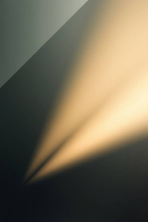 abstract background with light rays and shadow on a dark wall.の写真素材