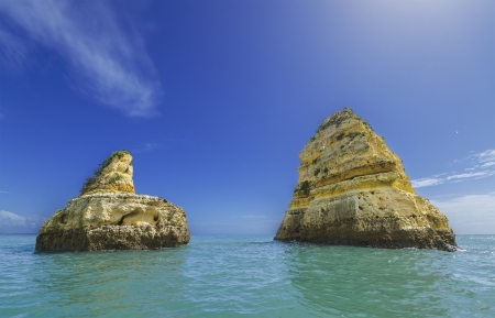 Rocks in the Ocean  Algarve coastline Portugalの写真素材