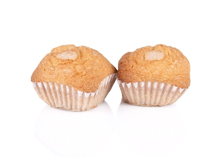 Pair of cupcakes over white isolated backgroundの写真素材