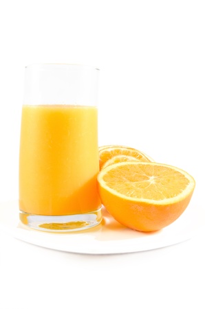 Orange juice with orange slices over white isolated backgroundの写真素材