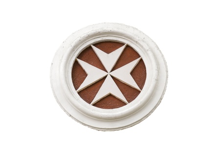 Ancient Templar symbol of stone over white isolated backgroundの写真素材