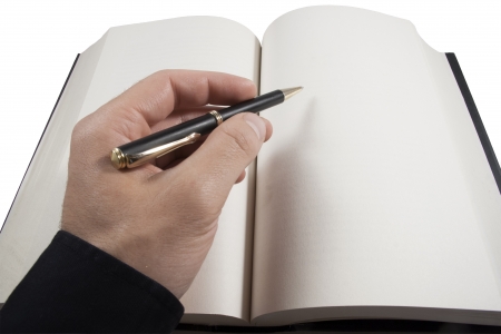 Hand writing in blank open book with ball penの写真素材