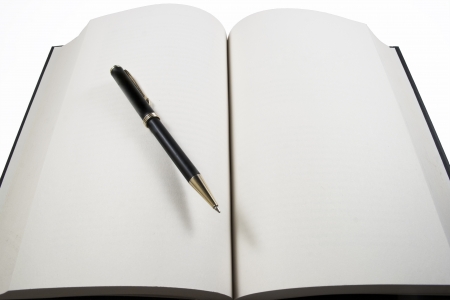 Blank open book with ball penの写真素材