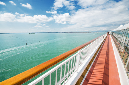 Scenic view of a cruise ship main deck sailing in the ocean.の写真素材