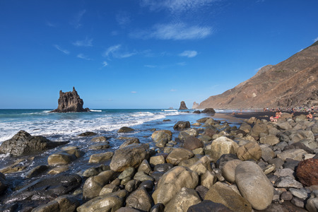 TAGANANA, SPAIN - SEPTEMBER 20: Tourist relaxing in Benijo beach on September 20, 2016 in Tenerife, Canary islands, Spain.のeditorial素材