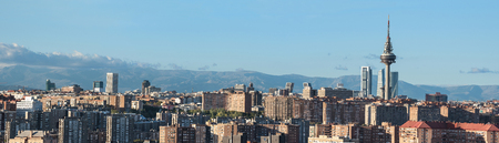 Madrid cityscape panorama with some emblematic buildings: skyscrapers, piruli, and kio towers....