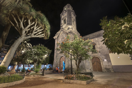 PUERTO DE LA CRUZ, SPAIN - AUGUST 15: Nuestra senora de la pena church at night on August 15, 2016 in Puerto de la Cruz, tenerife, Spain.のeditorial素材