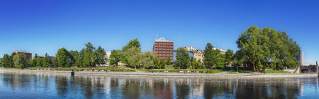 TAMPERE, FINLAND - JUNE 2012: Panorama of Tampere river with hotels and office buildings in the background on June 16, 2012 in Tampere, Finland.の写真素材