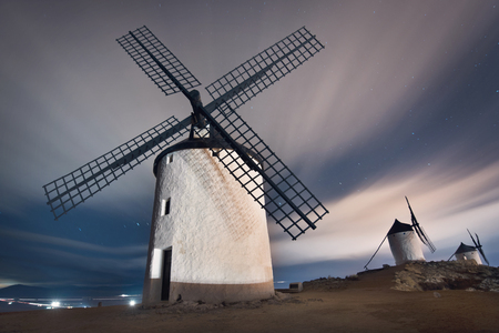 Don Quixote windmills at night. Famous landmark in Consuegra, Toledo Spain.の写真素材