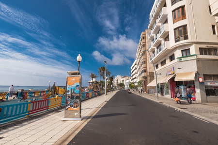 Arrecife, Spain - February 12, 2018: Arrecife cityscape, people walking in a promenade in Lanzarote, Canary islands, Spain.のeditorial素材