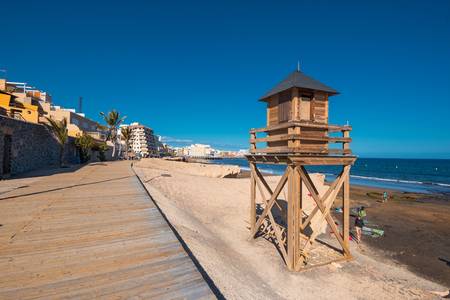 El Medano, Spain: Tourist relaxing in El medano beach, Tenerife, Canary islands, Spain.の写真素材