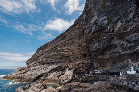 Hidden houses in the tourist attraction pirate cave of El Poris de Candelaria, in La Palma island, Canary islands, Spain.の写真素材