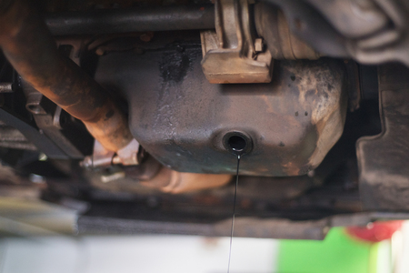 removing used engine oilの写真素材