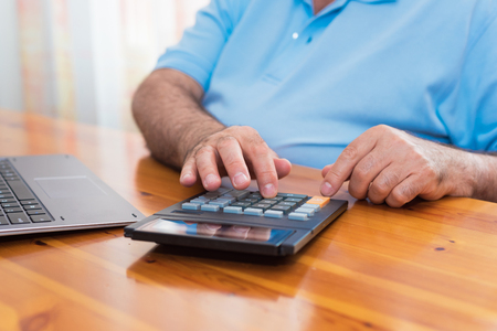 Man doing his accounting, financial adviser.のeditorial素材
