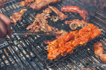 Assorted grilled meat on a barbecue