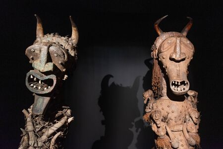 Tenerife, Spain - February 8 2019 : African tribal wooden hand carved mask at African tribal culture exhibition.のeditorial素材