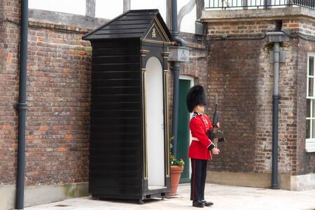 London, United Kingdom - May 12, 2019: Guard in Castle Tower of London. British Guard in red...