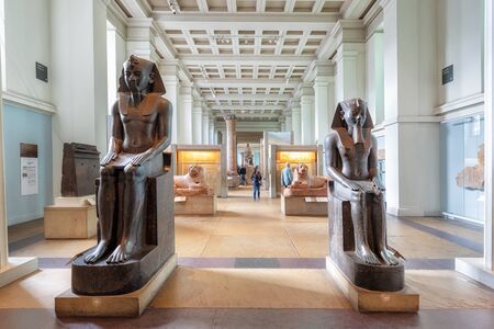 London, United Kingdom - May 13, 2019: The British Museum, London. Hall of Ancient Egypt, artifacts, busts and statues with visitors and tourists admiring the exhibition.のeditorial素材