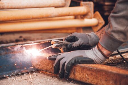 Close-up of the welding process of two metal parts. Industrial background.の写真素材
