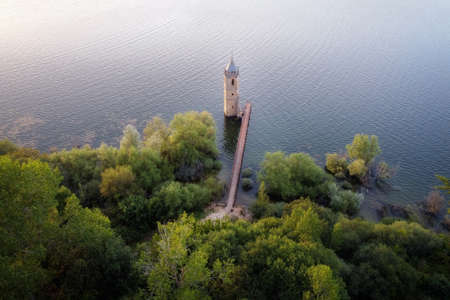 Aerial view of The fish cathedral. Sunken church ruins located in the Ebro reservoir in Cantabria, in the north of Spain. High quality photoの写真素材