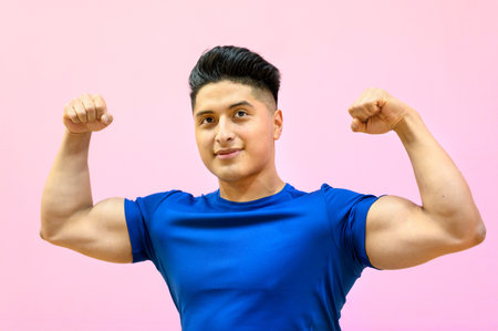 Sportsman With Muscular Body On Pink Backgroundの写真素材
