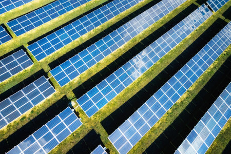 Aerial view of solar panels on a sunny day. power farm producing clean energy.