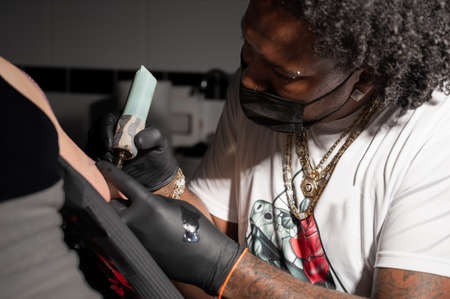 Body art at the tattoo studioの写真素材
