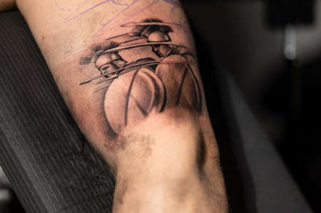 Close up view, of a tattoo of an spartan warrior.の写真素材
