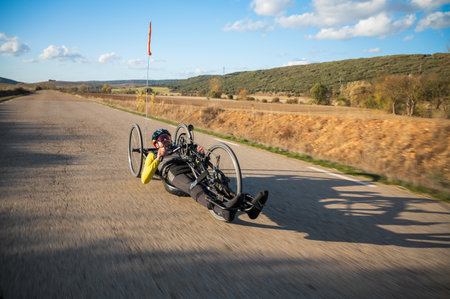 Athlete with disability training with His Handbike on a Track.の写真素材