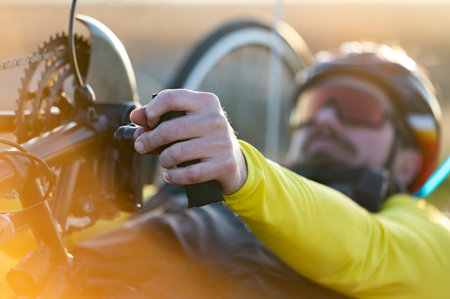 Close up of an athlete with disability preparing hand bike for training.の写真素材