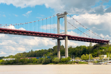 the pont dAquitaine is suspension bridge above the river Garonne in Bordeaux France.の写真素材