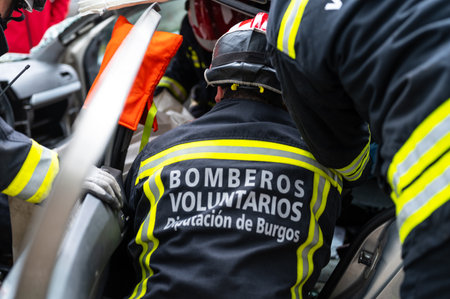 Car Crash Traffic Accident. Firefighters Rescue Injured Trapped Victims. Firemen give First Aid to passengers.の写真素材