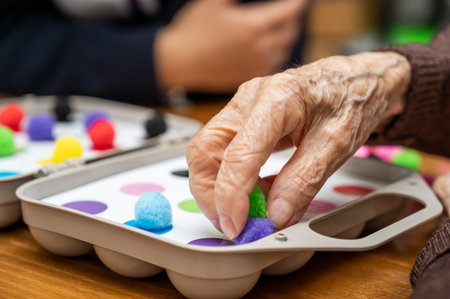 Rehabilitation center. Brain therapy cognitive psychological testing on senior patient. Alzheimers disease and dementia prevention concept. Adaptation skills recoveryの写真素材