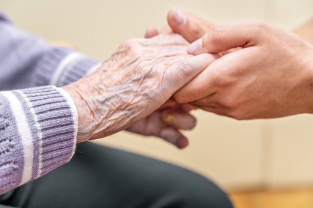 Helping hands, care for the elderly conceptの写真素材