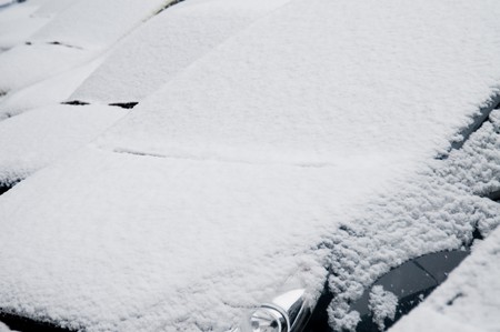 Close up of snow covered car windshieldsの写真素材