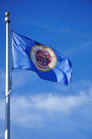 Minnesota State Flag Against a Blue Skyの写真素材