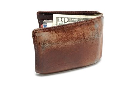 Old Worn Wallet with 10 Dollar Bill Isolated on White 