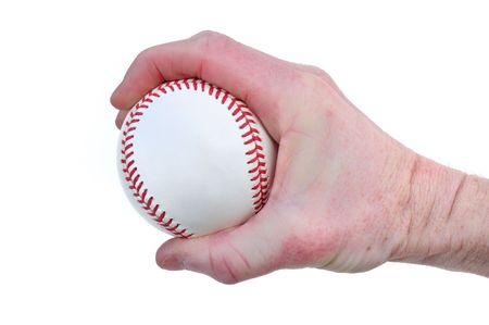 Player Gripping a New Baseball Isolated on Whiteの写真素材