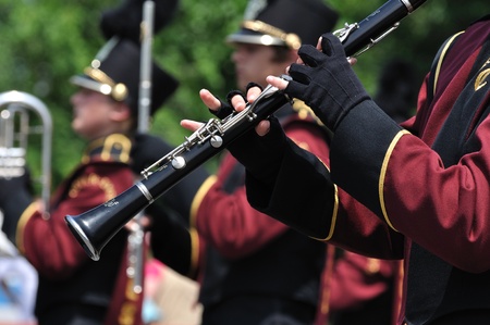 OSSEO, MN - JUNE 26 : Marching Band Performer from Dover-Eyota High School Playing Clarinet in in the Osseo Marching Band Festival on June 26, 2010 in Osseo, MNのeditorial素材
